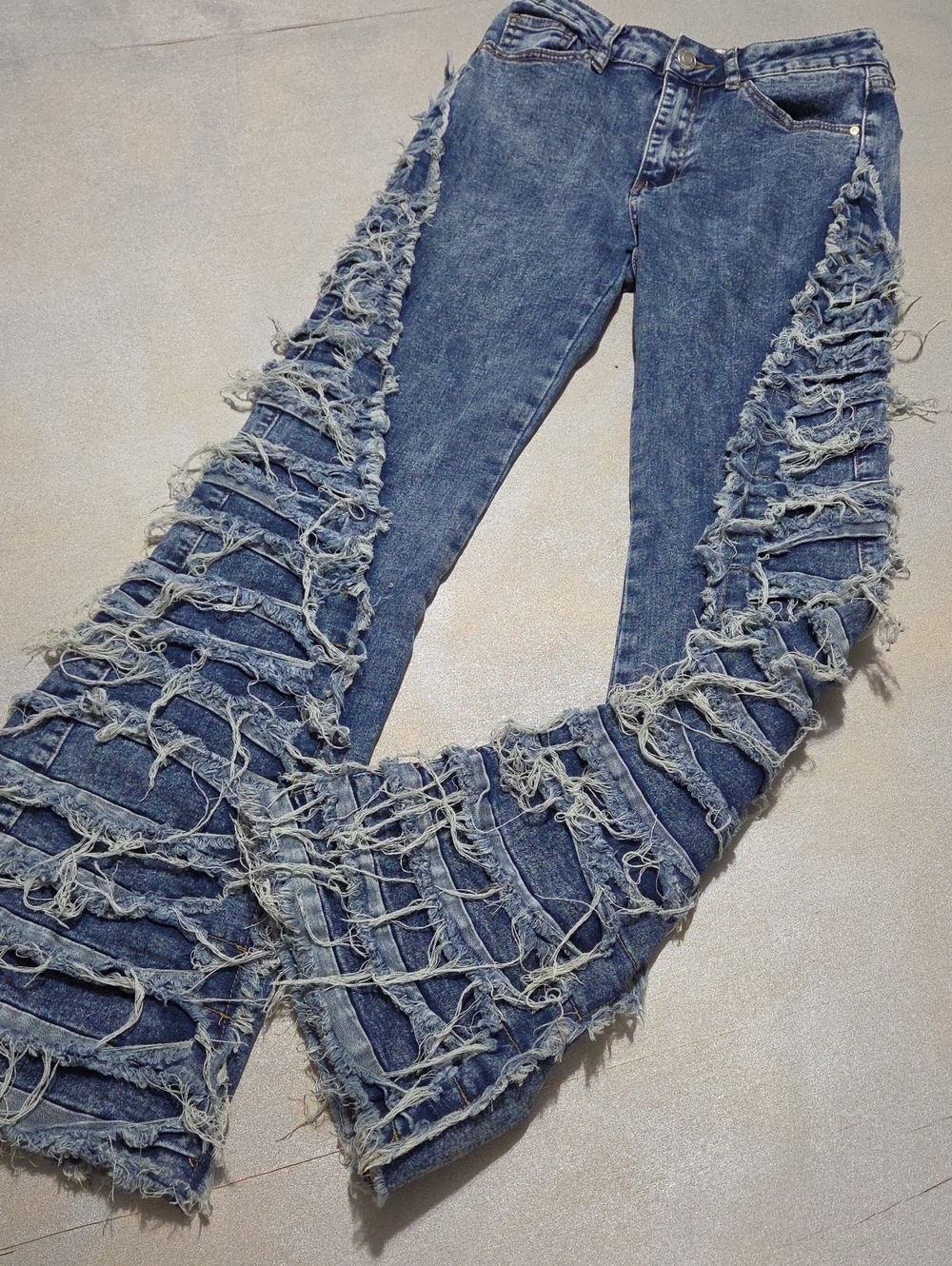 RISE.  Frayed Blue Distressed Flare Jeans